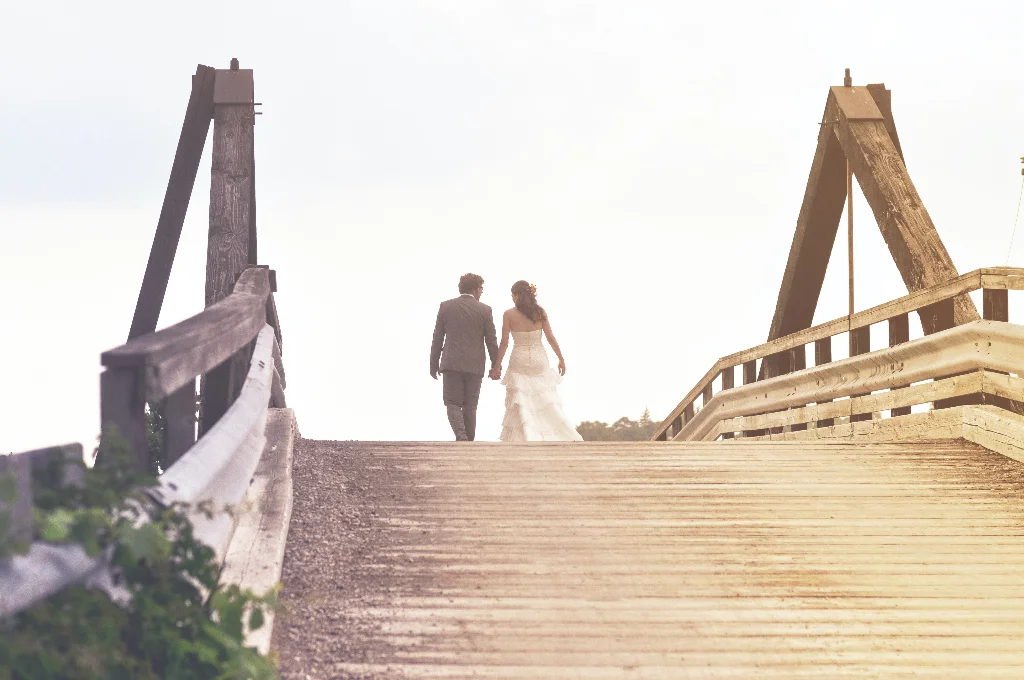 Newlyweds on bridge