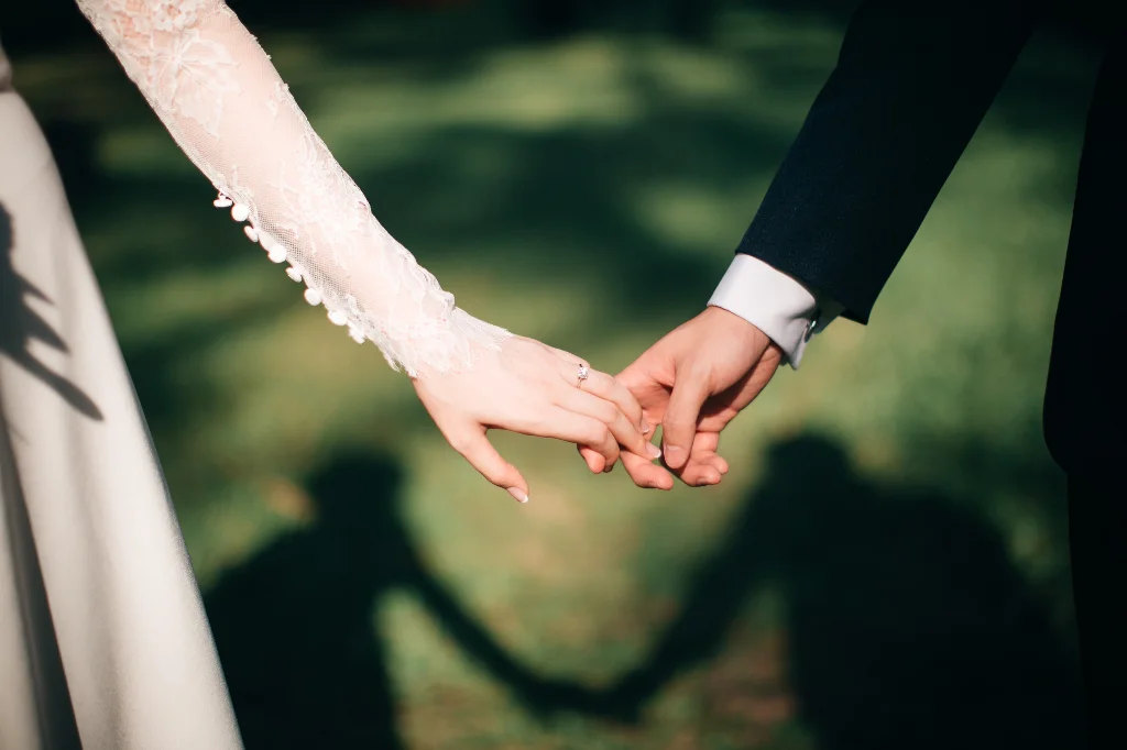 Couple holding hands